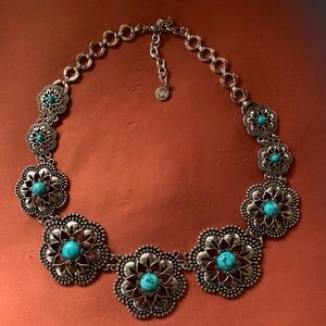 Gorgeous squash blossom necklace… silver tone Made by Craziano.